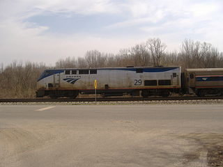 Amtrak P42DC locomotive #29 with a Blue Water or Wolverine train waits on a siding for a train in the opposite direction to pass in Comstock, Michigan