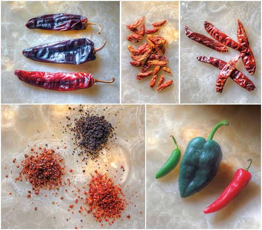 Dried chiles shipped well worldwide. From top-left: New World Capsicum annuum varieties include guajillo, ancho and New Mexico; a smaller Capsicum frutescens variety called “birdseye” chiles spread wild in Africa after birds spread their seeds from early gardens, and they are now common also in Southeast Asia; “Indian” chiles are among the most common varieties in India, which today grows and exports more chiles than any other nation. Bottom-left: Three popular capsicum peppers that took root in the Middle East—Maraş, Urfa and Aleppo, shown below in their flaked form—are used in dishes throughout the region. Bottom-right: Fresh serrano, poblano and ripe jalapeño peppers. 