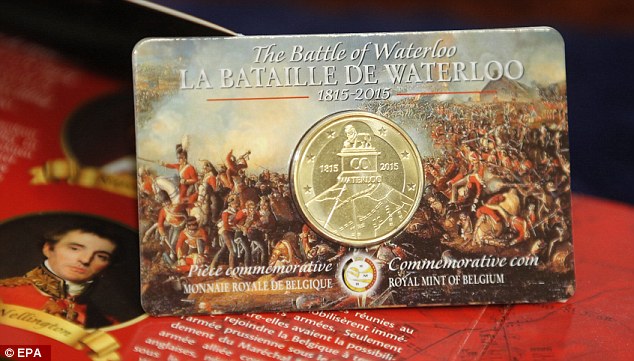 The new Belgian coin in its decorative holder. Click to see the original image at the Daily Mail.