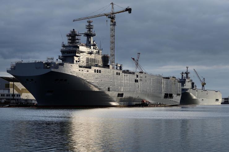The Sevastopol (left) and the Vladivostok warships, two Mistral class LHD amphibious vessels ordered by Russia from STX France, are seen in St. Nazaire, France, Dec. 20, 2014. Jean-Sebastien Evrard/Agence France-Presse/Getty Images 